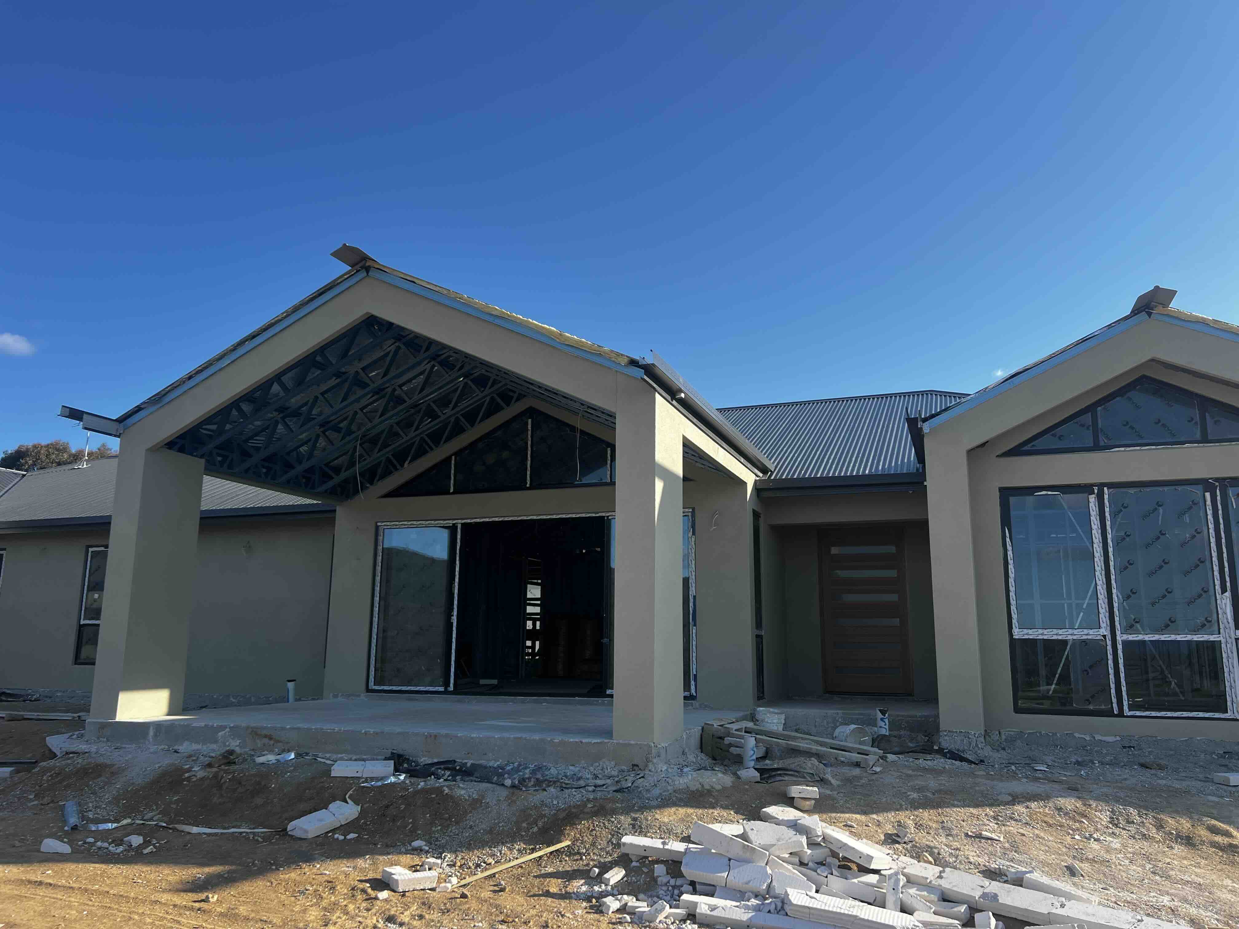 Barra's Texture Rendering - Professional masonry project in Barra, Canberra showcasing quality rendering and stonework